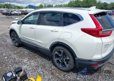 2017 Honda Crv Touring z USA, uszkodzony, nr VIN 5J6RW2H92HL011865